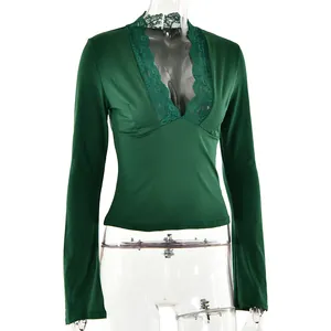 Detail view of sexy V-neck long sleeve top with dark green lace trim embroidery