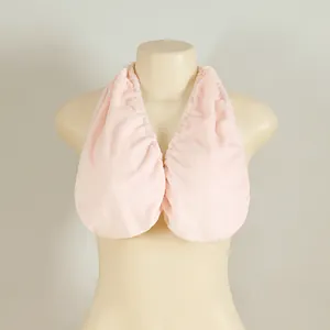 Pink plush halter towel bra detail showing soft absorbent fabric for breast support.