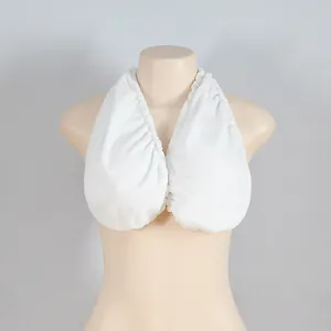 Detailed close-up view of a white halter neck towel bra showing soft absorbent fabric texture