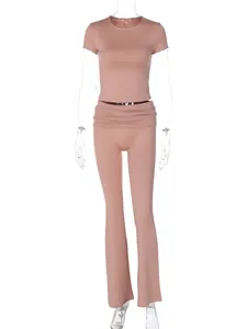 Elegant 2-piece set featuring dusty rose short sleeve crop top and flared leggings for women