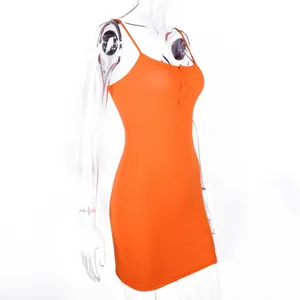 Detailed side view of a vibrant orange ribbed bodycon cami dress with button neck detail