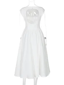 Back view of elegant white French style dress featuring a large hollow-out detail and flutter sleeves