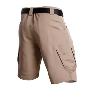 Close-up detail of khaki tactical cargo shorts showing back pockets and durable ripstop fabric