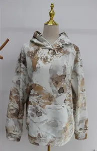 Women's oversized hoodie with abstract maple leaf camouflage print and kangaroo pocket