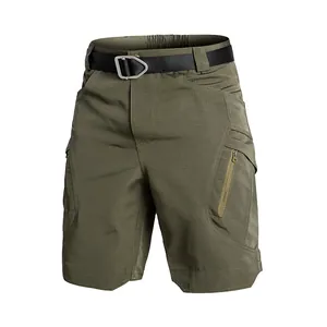 Close-up of olive green tactical cargo shorts with multi-pockets and tactical belt