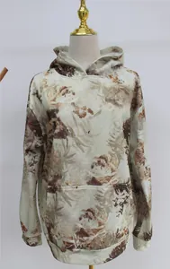 Women's oversized hoodie featuring a maple leaf camouflage print and kangaroo pocket