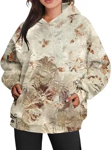 Detailed view of women's oversized hoodie with autumn maple leaf abstract print