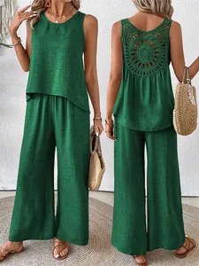 Detailed view of green sleeveless two-piece set featuring intricate back crochet detail.