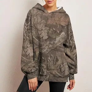 Full front view of women's oversized maple leaf camouflage hoodie with a pocket