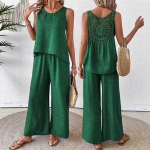 Two-piece green sleeveless set featuring elegant hollow-out back detail and wide-leg pants