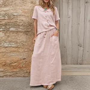 Elegant pink cotton linen two-piece set featuring short sleeve shirt and long skirt
