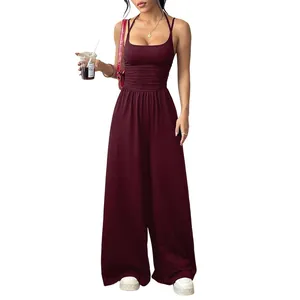 Elegant maroon sleeveless wide-leg jumpsuit with pleated waist detail for casual summer wear