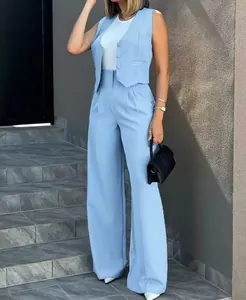 Full view of stylish elegant light blue vest and wide-leg trouser leisure suit set for women