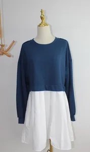 Modern fake two-piece sweatshirt dress featuring a navy blue top and a white pleated skirt detail
