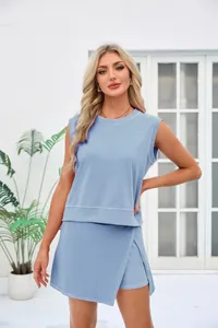 Detailed view of a woman wearing a light blue casual two-piece sleeveless set