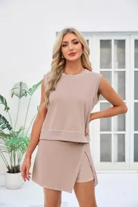 Detailed view of women's sleeveless rose pink two-piece set with stylish wrap skirt