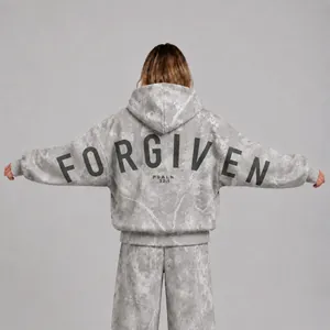 Detailed view of oversized grey marble hoodie featuring FORGIVEN and PSALM print on the back