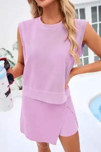 Detail shot of lilac two-piece casual set featuring a knit sleeveless top and skort