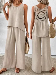 Beige two-piece linen set featuring sleeveless top and back crochet detail trousers