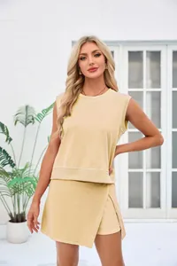 Elegant women's yellow sleeveless lounge set featuring a stylish wrap skirt design