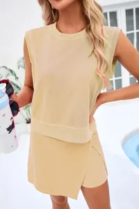 Casual sleeveless knit top and wrap skirt set in beige, summer resort fashion detail