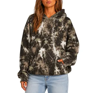 Oversized women's hoodie featuring a camouflage maple leaf print with a spacious front pocket.