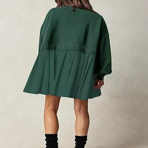 Back view of a dark green sweatshirt dress featuring a pleated hem and heart detail
