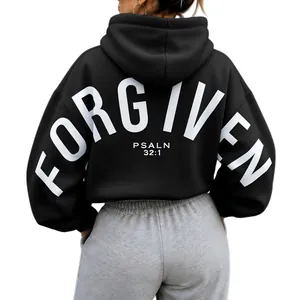 Back view of oversized black hoodie with white FORGIVEN letter print and Psalm text.