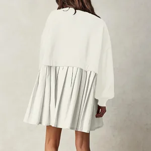 Detailed back view of a white mock two-piece long sleeve sweatshirt dress with pleated hem