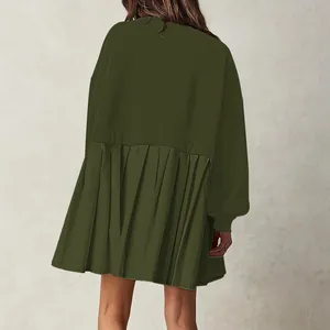 Back detail view of an army green oversized sweatshirt dress featuring a pleated hem