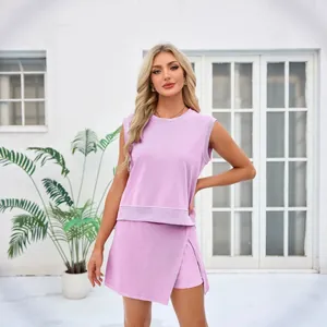 Woman in a lilac two-piece cotton casual leisure set with sleeveless top and skort