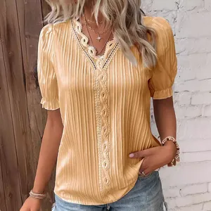 Fashionable yellow short-sleeve blouse with hollow-out lace details for summer vacation