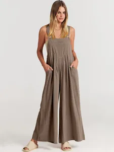 Mono casual de algodón y lino marrón liso con perneras anchas y bolsillos mujer.