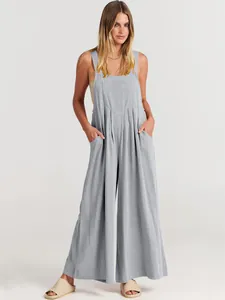 Mono casual de algodón y lino azul claro con perneras anchas y bolsillos
