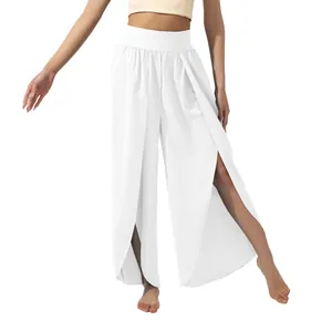 Detailed macro view of white high-waist yoga pants featuring stylish high side slits for flow.