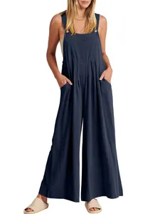 Mono casual de algodón y lino azul marino con tirantes de botones y bolsillos laterales