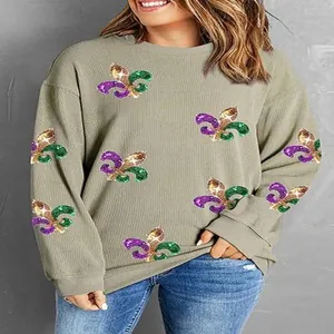 Casual women's crewneck sweatshirt with sequined Fleur-de-lis embroidery on ribbed fabric