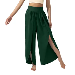 Detail view of green high-waisted yoga pants with high side slits for movement.