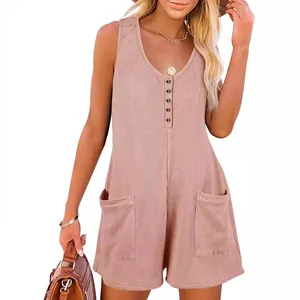 Casual waffle knit sleeveless romper with button front and pockets in pinkish beige.
