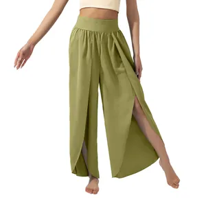 Close-up detail of high-waisted wide-leg yoga pants with high side slits in olive green