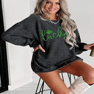 Oversized women's charcoal grey sweatshirt with green Lucky clover glitter print