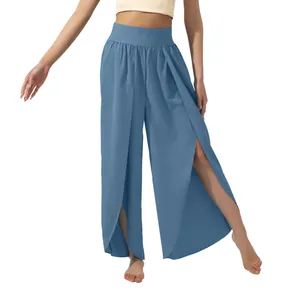 Macro detail of high-waisted dusty blue yoga pants with elegant side slits for flowy movement
