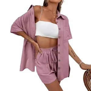 Women's two-piece set featuring mauve short-sleeved shirt and drawstring shorts