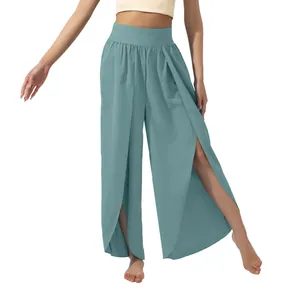 High-waisted wide-leg yoga trousers featuring stylish front slits in breathable teal fabric