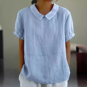 Casual light blue short sleeve cotton blouse with a white Peter Pan collar detail