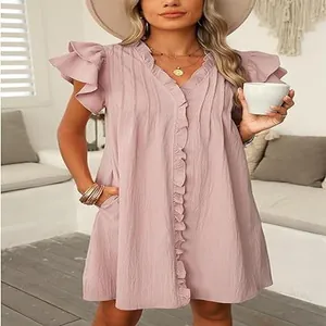 Detail view of mauve V-neck ruffle mini dress with short sleeves in a stylish loose fit