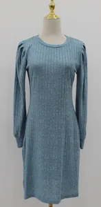 Detail view of a blue ribbed knit long sleeve dress featuring puff sleeve accents