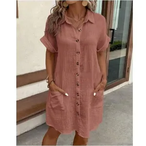 Short-sleeved pink V-neck cotton linen shirt dress featuring button-front and pockets
