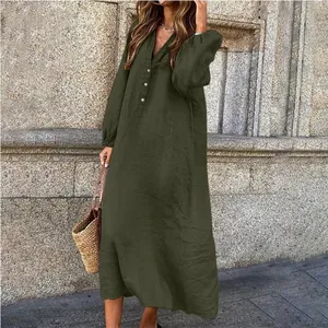Close-up of olive green cotton linen maxi dress with V-neck and buttons