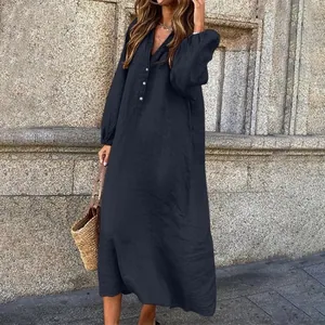 Detailed view of women's navy blue cotton linen long sleeve V-neck buttoned maxi dress